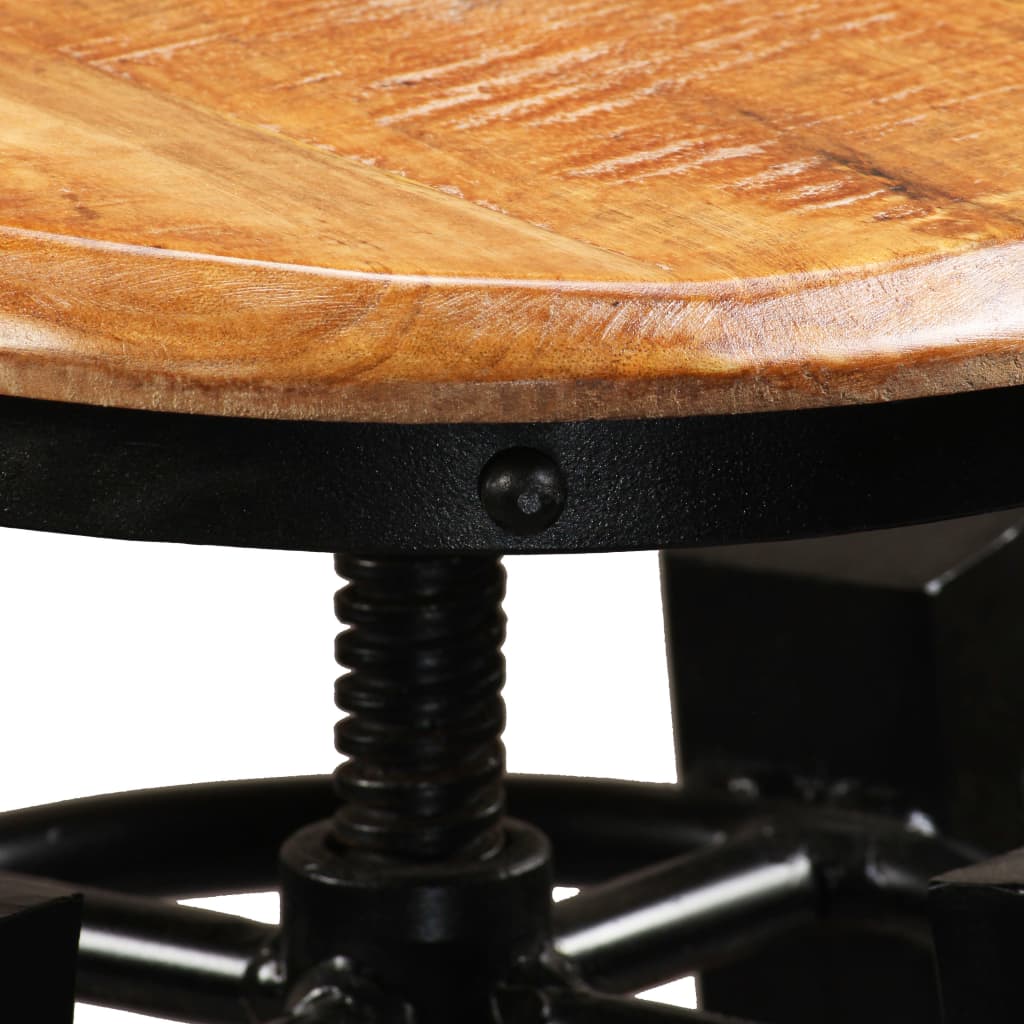 Gros plan sous l’assise du tabouret de bar sur la vis de réglage en métal noir