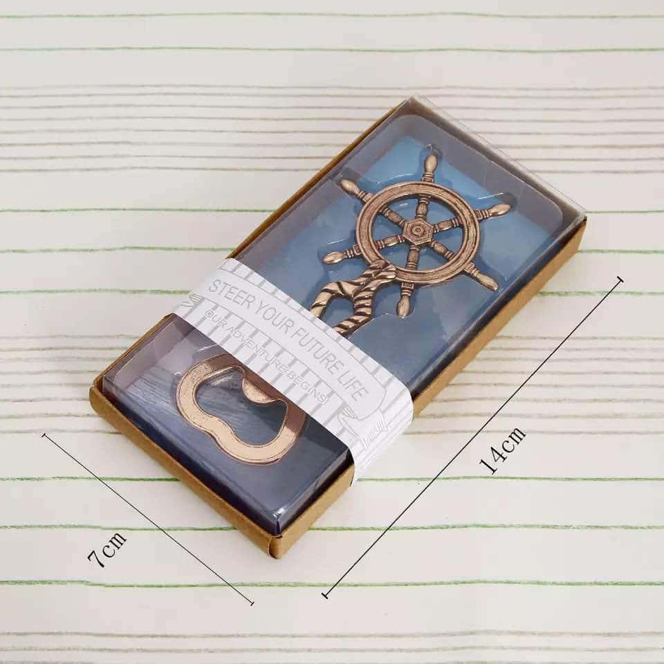 Schéma coté du Décapsuleur Gouvernail dans son coffret kraft, dimensions 7 x 14 cm, motif barre de navire